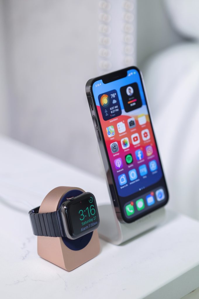 charge apple watch beside iphone